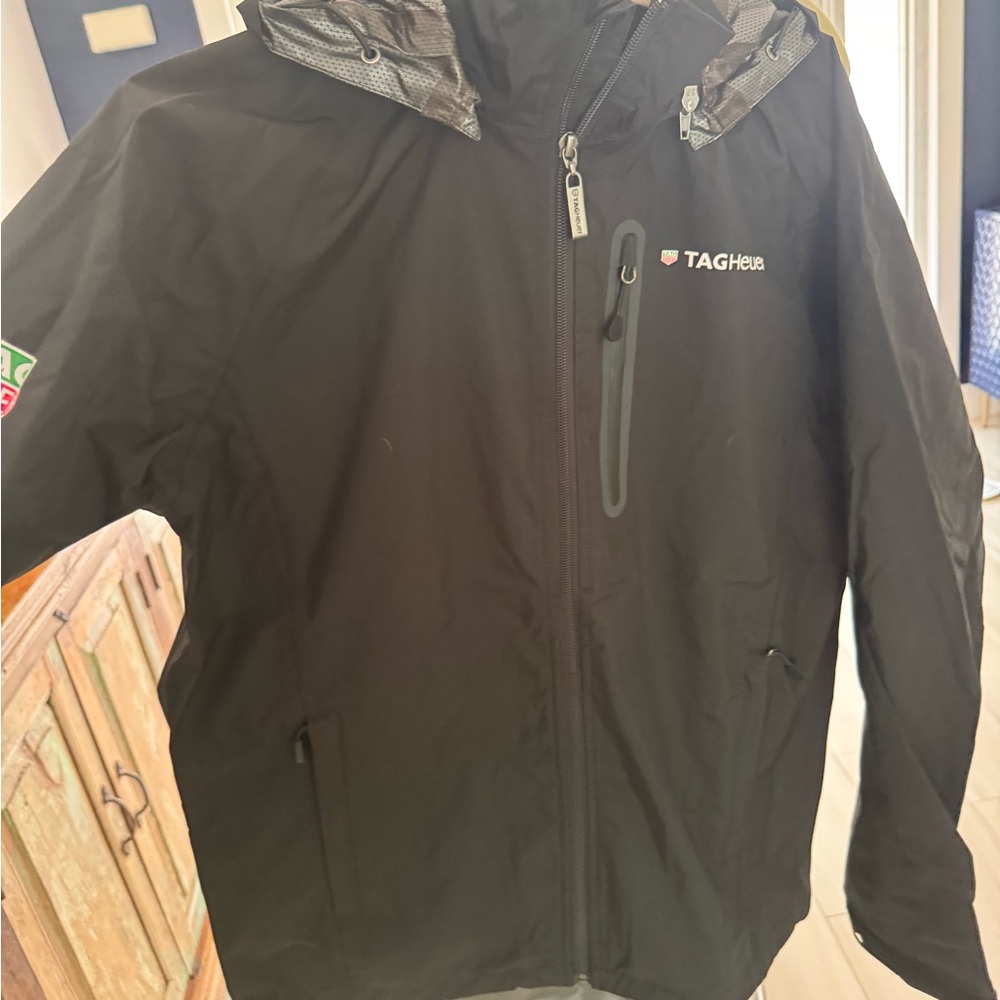 Tag Heuer Black Raincoat Sleek Design